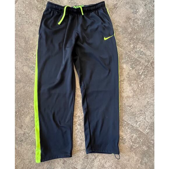 Nike Therma Fit, black with yellow stripe down legs, joggers, men's size XL - Picture 1 of 4